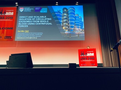 HuiMin presenting at Microtas 2019, Basel, Switzerland