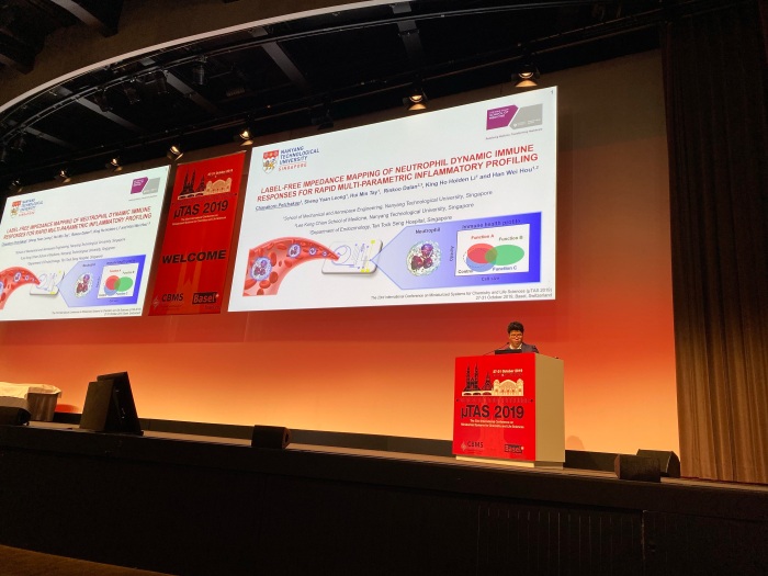 Chayakorn presenting at Microtas 2019, Basel, Switzerland